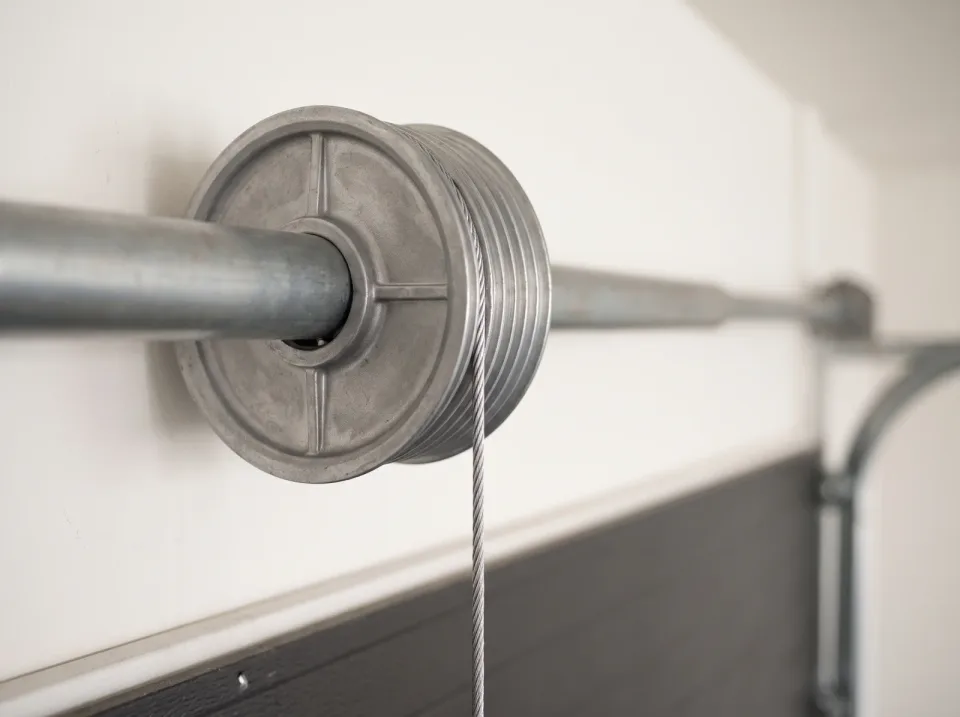 Garage door lift cable seated in a cable drum